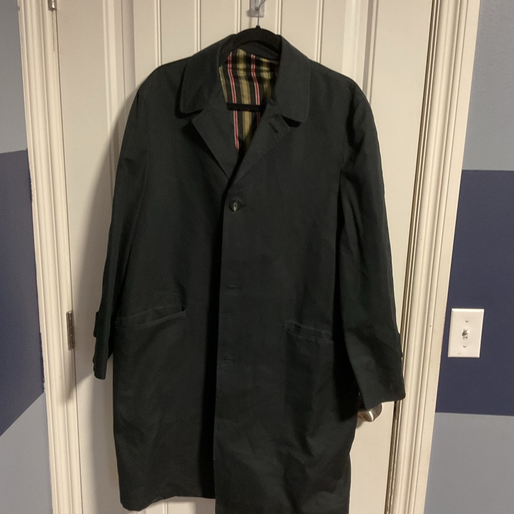 Black Trench Coat with Classic Lapel and Long Silhouette